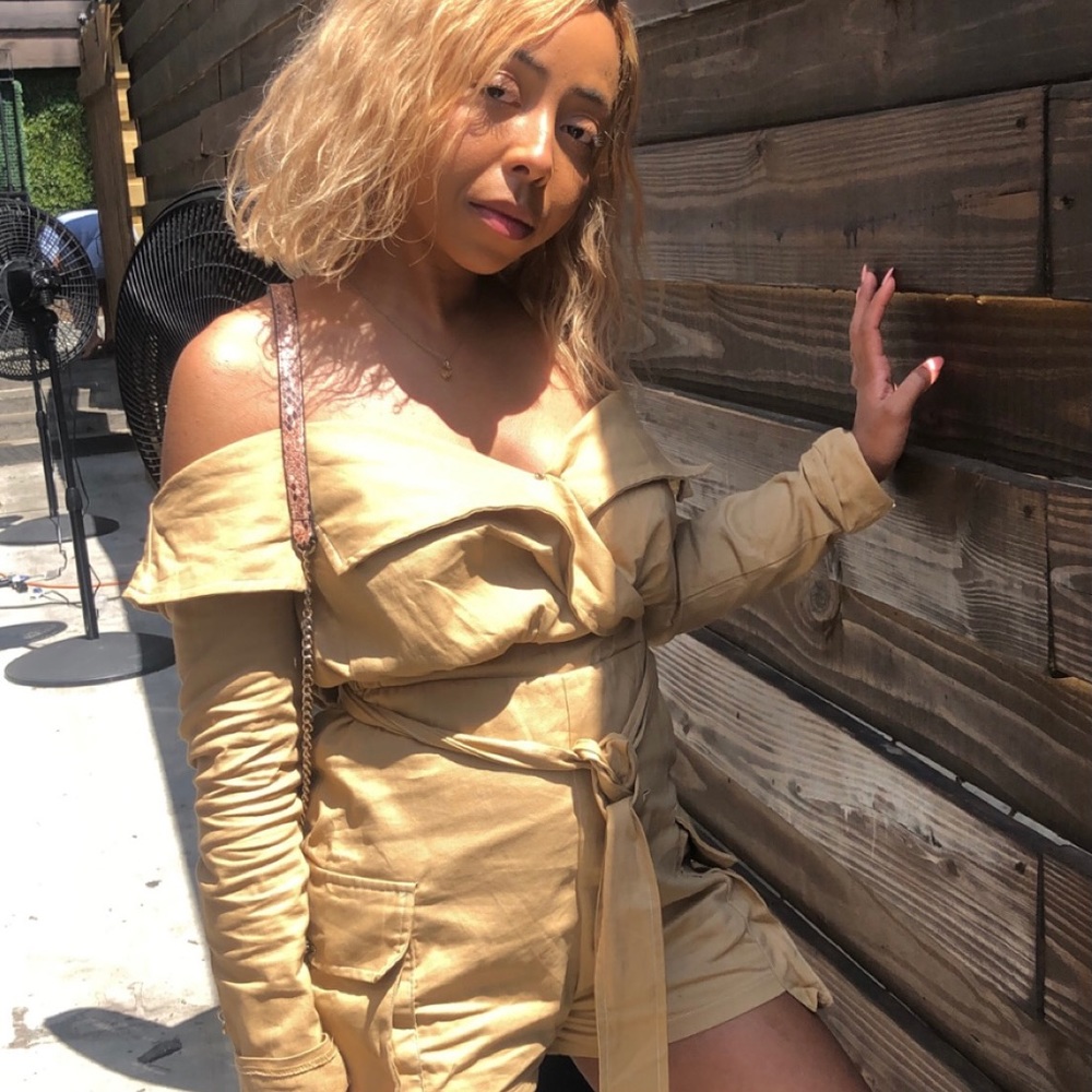 Pretty Little Thing: Tan utility romper.